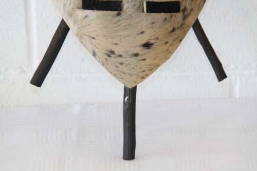 An amazing traditional Zulu cowhide shield with a spear and knobkierie