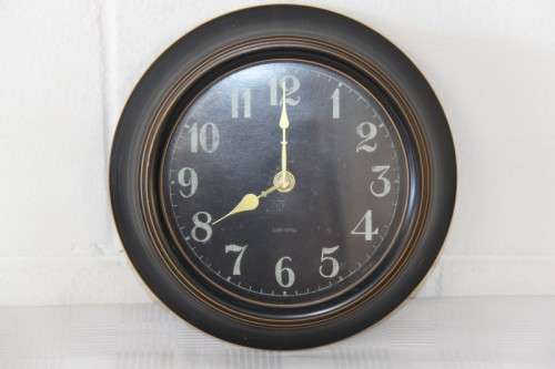 A lovely battery operated wall clock in perfect working condition