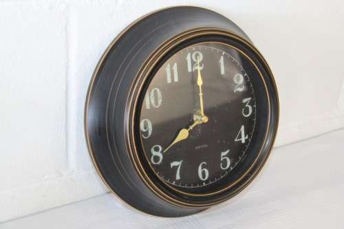 A lovely battery operated wall clock in perfect working condition