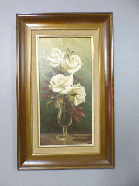 A beautiful oil painting of roses by renowned artist Rose-Mary Hacking. Stunning in home or office!!