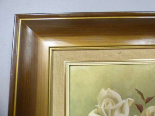 A beautiful oil painting of roses by renowned artist Rose-Mary Hacking. Stunning in home or office!!