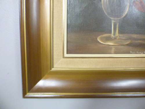 A beautiful oil painting of roses by renowned artist Rose-Mary Hacking. Stunning in home or office!!