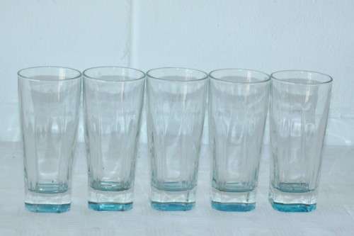 A superb set of 5x original Bombay Sapphire Gin branded glasses in mint condition; bid/glass