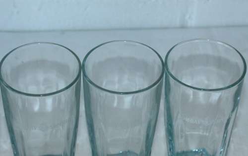 A superb set of 5x original Bombay Sapphire Gin branded glasses in mint condition; bid/glass
