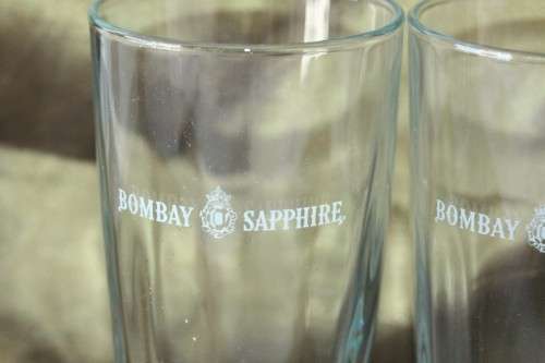 A superb set of 5x original Bombay Sapphire Gin branded glasses in mint condition; bid/glass