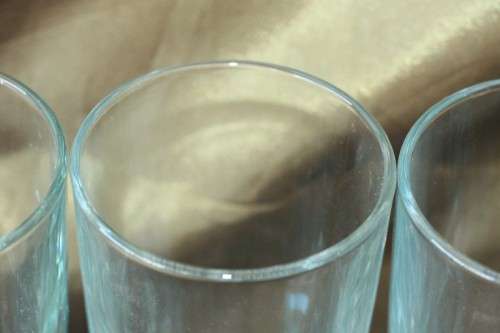 A superb set of 5x original Bombay Sapphire Gin branded glasses in mint condition; bid/glass