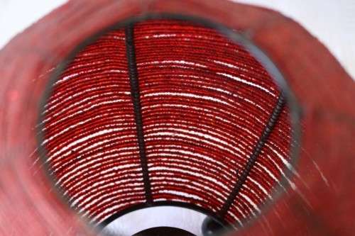 Two exquisite red beaded candle holders on a solid metal frame and metal feet; bid/holder