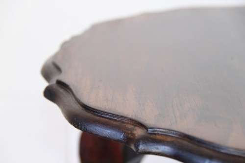 A superb scalloped edge solid oak ball and claw occasional table in wonderful condition