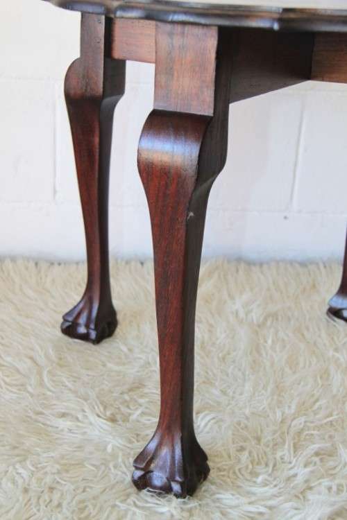 A superb scalloped edge solid oak ball and claw occasional table in wonderful condition