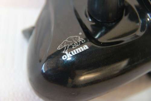 An amazing "Okuma Chaser AX-65" fishing reel with line in very good condition