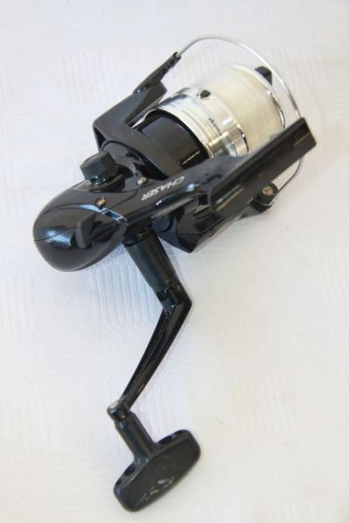 An amazing "Okuma Chaser AX-65" fishing reel with line in very good condition