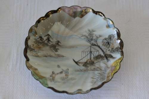 Two rare antique Japanese "translucent" porcelain teacups and saucers with amazing hand painted work