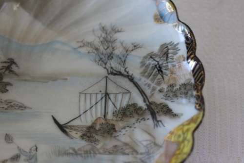 Two rare antique Japanese "translucent" porcelain teacups and saucers with amazing hand painted work