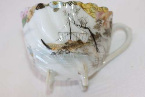 Two rare antique Japanese "translucent" porcelain teacups and saucers with amazing hand painted work