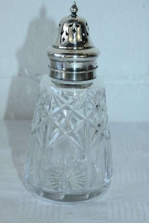 A stunning mid-century "lead cut-crystal" sugar muffineer (decanter) with a silver plated lid