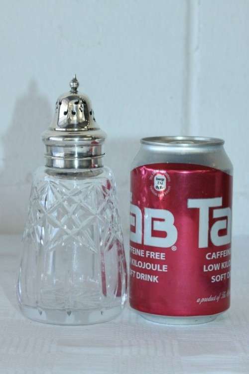 A stunning mid-century "lead cut-crystal" sugar muffineer (decanter) with a silver plated lid