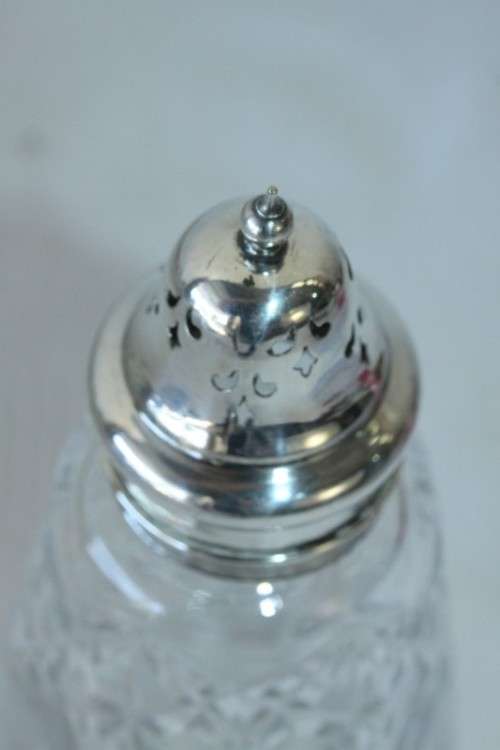 A stunning mid-century "lead cut-crystal" sugar muffineer (decanter) with a silver plated lid