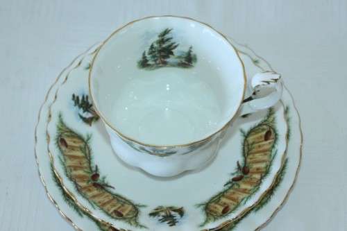 An incredibly rare vintage "Royal Albert" Knotty Pine trio, including teacup, saucer & cake plate