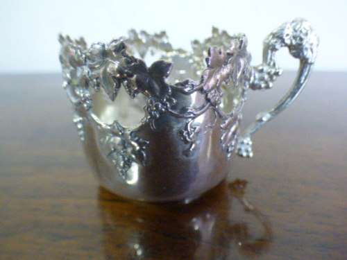 Magnificent boxed antique Royal Worcester demitasse duo's with gold detailing in silver cup holders!