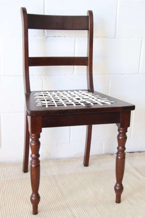 A stunning solid imbuia "riempie" occasional/ dining chair in fantastic condition