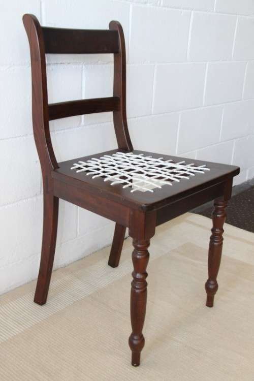 A stunning solid imbuia "riempie" occasional/ dining chair in fantastic condition