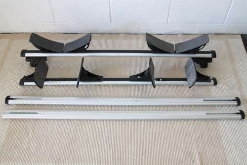 Two sets of amazing Thule lightweight aluminium kayak roof racks with accessories in great condition