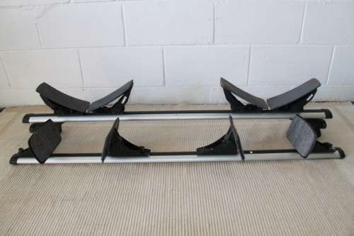 Two sets of amazing Thule lightweight aluminium kayak roof racks with accessories in great condition