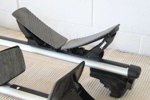 Two sets of amazing Thule lightweight aluminium kayak roof racks with accessories in great condition