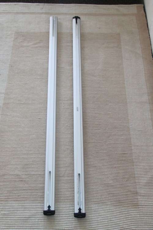 Two sets of amazing Thule lightweight aluminium kayak roof racks with accessories in great condition
