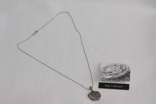 An exquisite original Jenna Clifford sterling silver "The Rose" pendant on an Italian silver chain