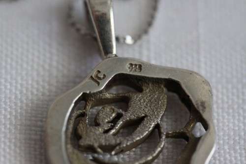 An exquisite original Jenna Clifford sterling silver "The Rose" pendant on an Italian silver chain