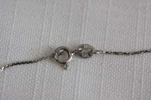 An exquisite original Jenna Clifford sterling silver "The Rose" pendant on an Italian silver chain