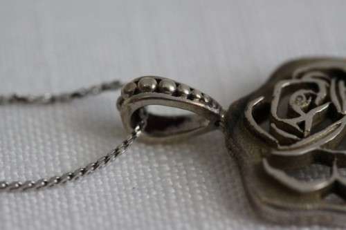 An exquisite original Jenna Clifford sterling silver "The Rose" pendant on an Italian silver chain