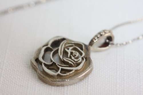 An exquisite original Jenna Clifford sterling silver The Rose pendant on an Italian silver chain bobshop .za