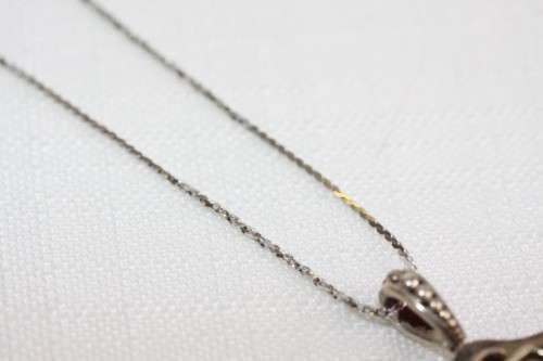 An exquisite original Jenna Clifford sterling silver "The Rose" pendant on an Italian silver chain