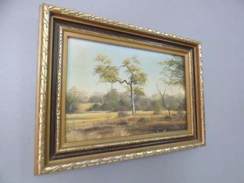 A beautiful signed and framed "V Jones" bushveld landscape oil painting in good condition; RS17Sale