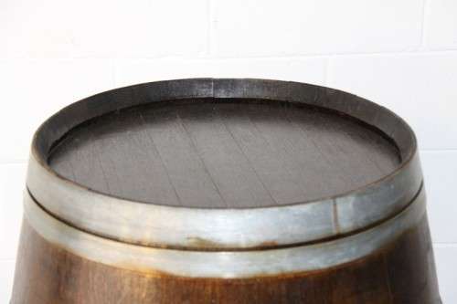 An incredible original solid French oak wine barrel with its original hoops in great condition