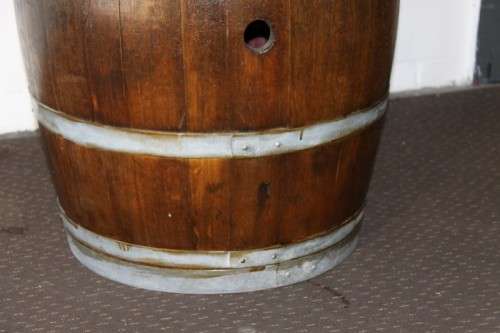 An incredible original solid French oak wine barrel with its original hoops in great condition