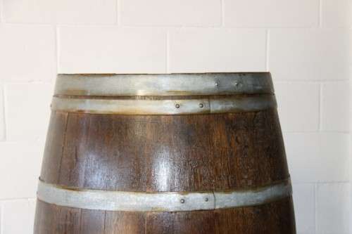 An incredible original solid French oak wine barrel with its original hoops in great condition