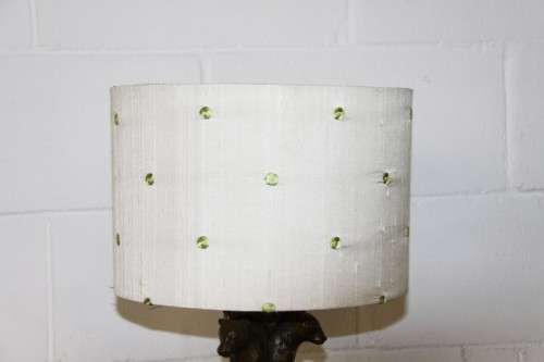 An exquisite tall "Leopard" moulded table lamp and shade with beautiful detailing in working order