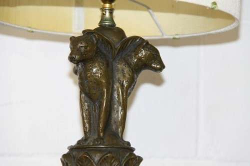 An exquisite tall "Leopard" moulded table lamp and shade with beautiful detailing in working order