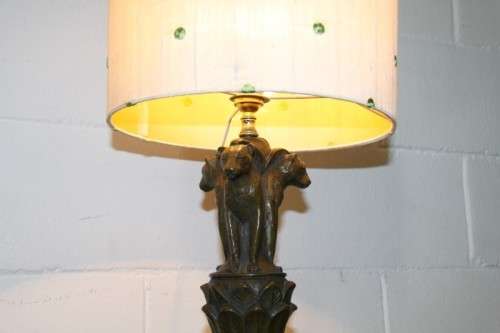 An exquisite tall "Leopard" moulded table lamp and shade with beautiful detailing in working order