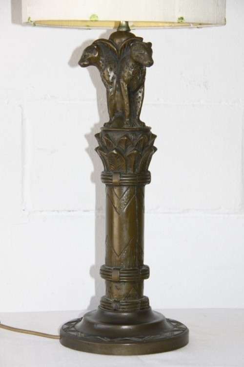 An exquisite tall "Leopard" moulded table lamp and shade with beautiful detailing in working order