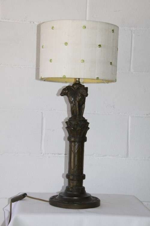 An exquisite tall "Leopard" moulded table lamp and shade with beautiful detailing in working order