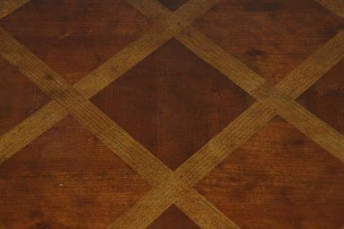 An awesome wooden centre coffee table with stunning inlay detailing and carved legs
