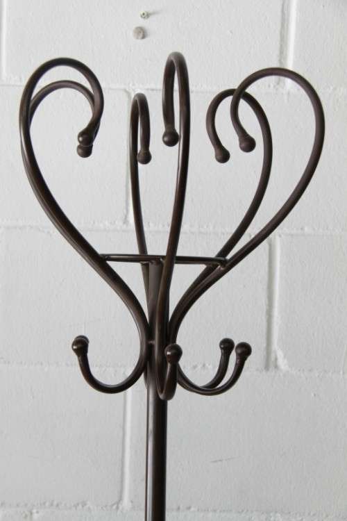 A stunning tall wrought iron coat rack/ hat stand with loads of space in very good condition