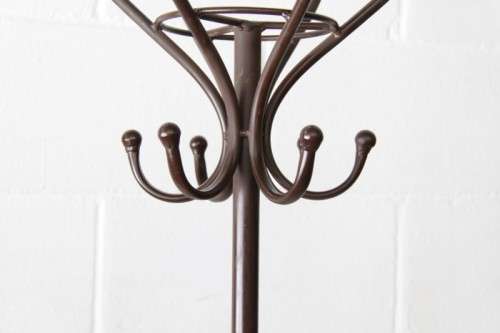 A stunning tall wrought iron coat rack/ hat stand with loads of space in very good condition