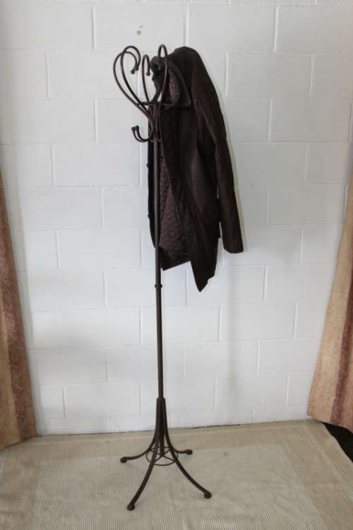 A stunning tall wrought iron coat rack/ hat stand with loads of space in very good condition