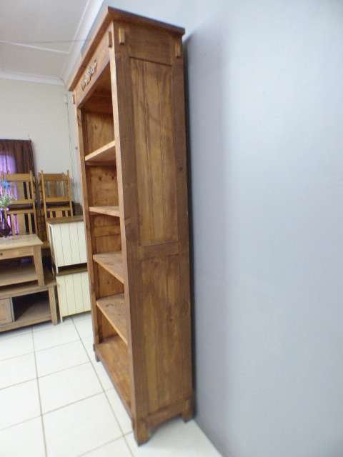 A lovely large, stylish wooden book case in great condition. Great in a study, reading room, office