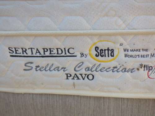 A top-quality queen size "Serta pedic" "Stellar Collection" mattress and base set in good condition